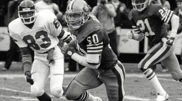 San Francisco 49ers linebacker Riki Ellison after an interception against...