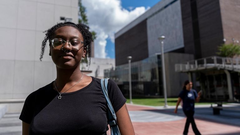 Anaya Bridges, a full-time student at Georgia State University, poses...