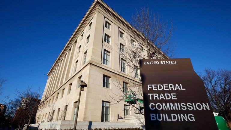 A sign stands outside the Federal Trade Commission building, Jan....