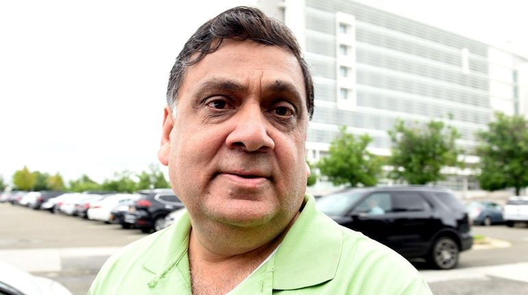 Harendra Singh is seen outside federal court in Central Islip...