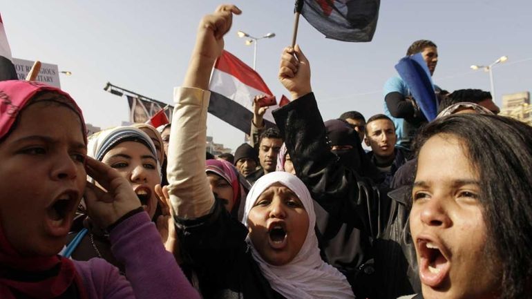 Egyptians in Cairo's Tahrir Square mark the first anniversary of...