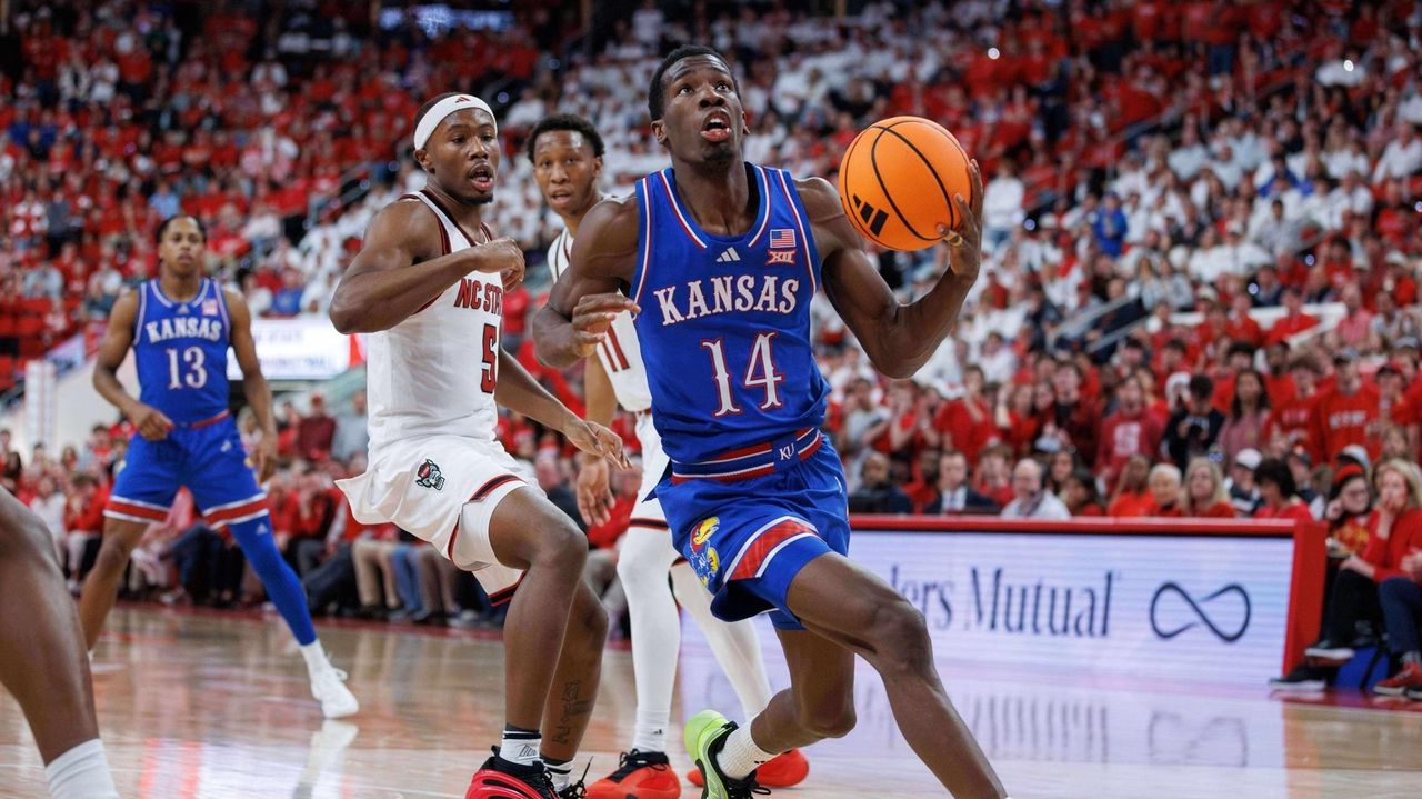 Council's huge day, final-play stop help No. 19 Kansas edge NC State in overtime 77-76