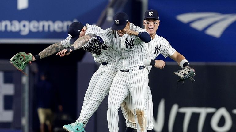 Alex Verdugo #24, Aaron Judge #99 and Juan Soto #22...