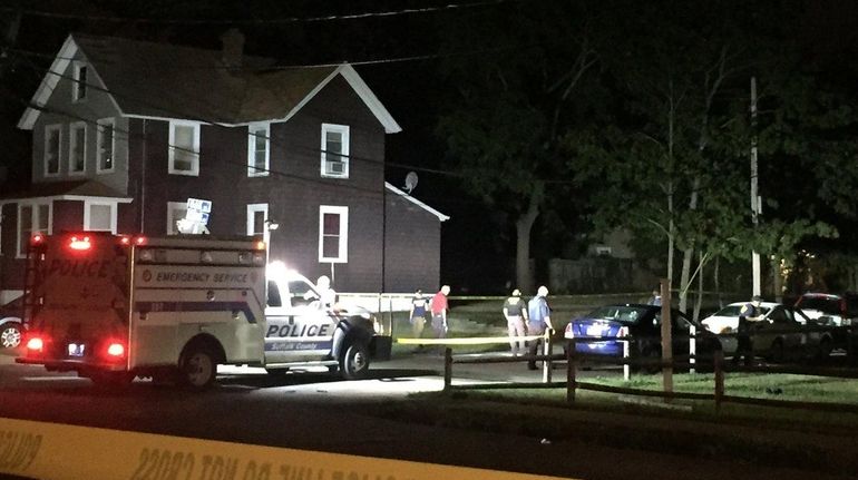 Investigators search Center Avenue in Bay Shore early Saturday, Sept....