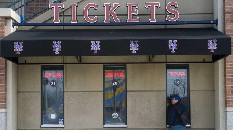 A Mets fan at the ticket window at Citi Field...