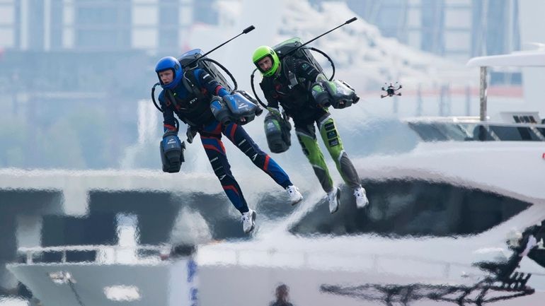 Jet suit pilots race in Dubai, United Arab Emirates, Wednesday,...