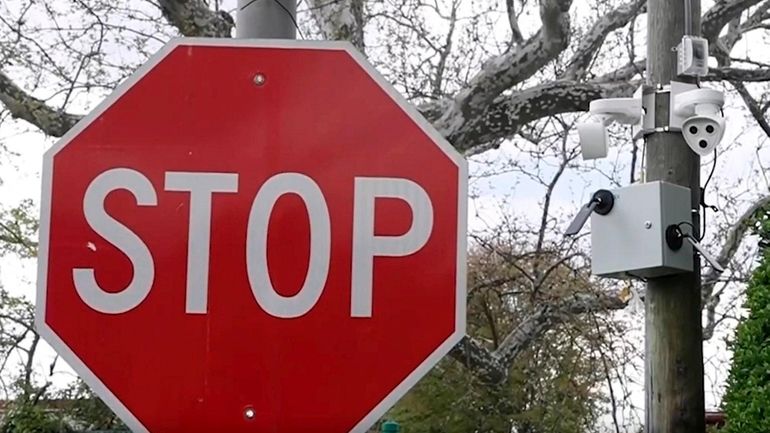 Stop sign cameras, like those in the village of Saddle...