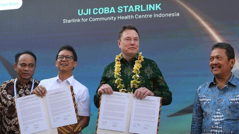 Indonesian Minister of Health Budi Gunadi Sadikin, second from left,...