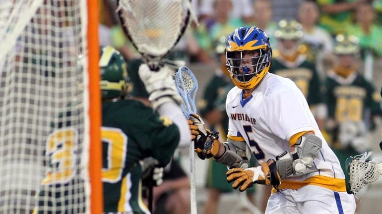 West Islip's Nick Galasso (5) sets up a shot in...