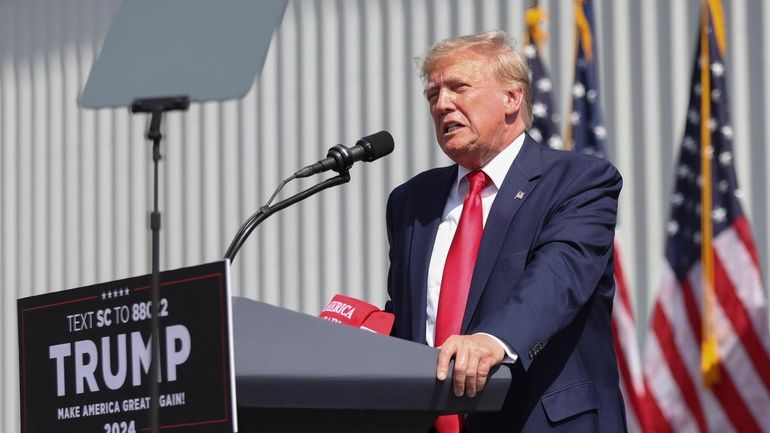 Former President Donald Trump speaks at a rally in Summerville,...