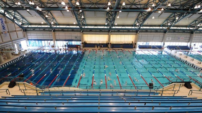 The bleachers inside Nassau Aquatic Center afford a view of...