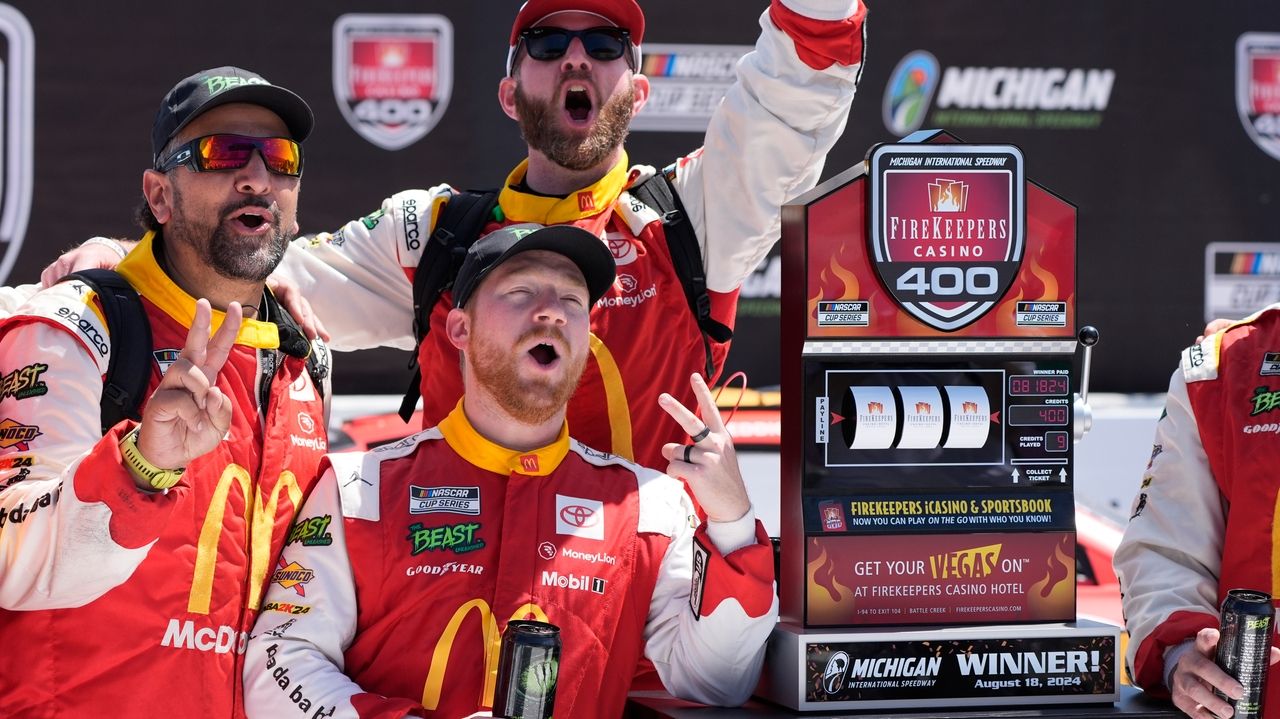 Tyler Reddick wins the rain-postponed NASCAR Cup race in Michigan, his second victory in 2024