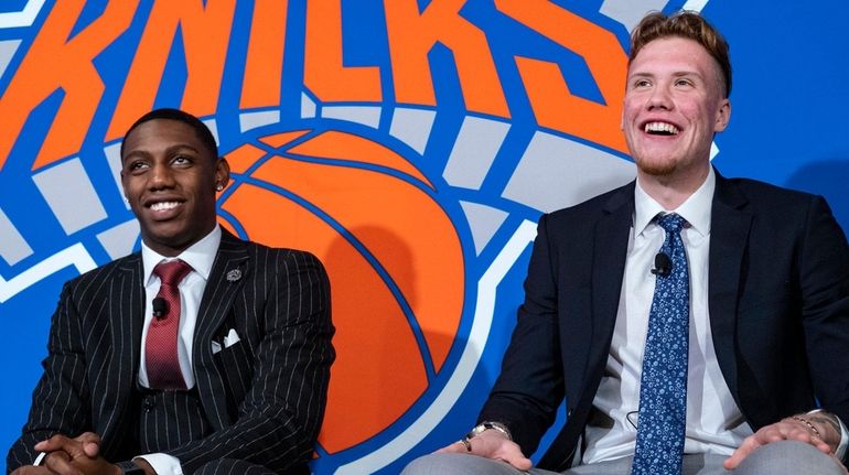 RJ Barrett, left, and Ignas Brazdeikis, smile during a news...