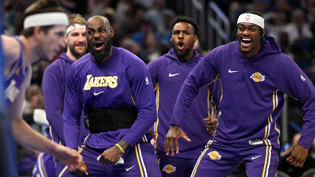 LeBron passes to Bronny for a 3-pointer and the NBA's first father-son assist, league says