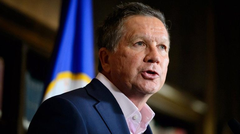 Republican presidential candidate John Kasich speaks at the Minneapolis Club...