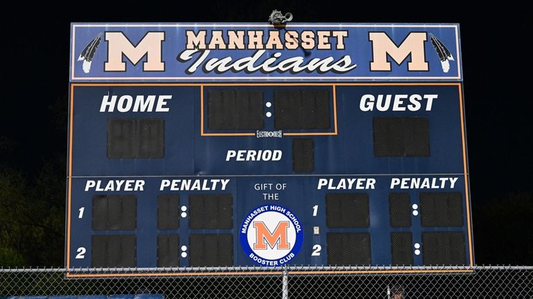 A scoreboard at Manhasset High School in April 2023, the...