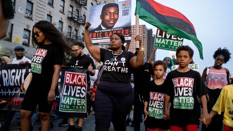 Activists with Black Lives Matter protest in the Harlem neighborhood...