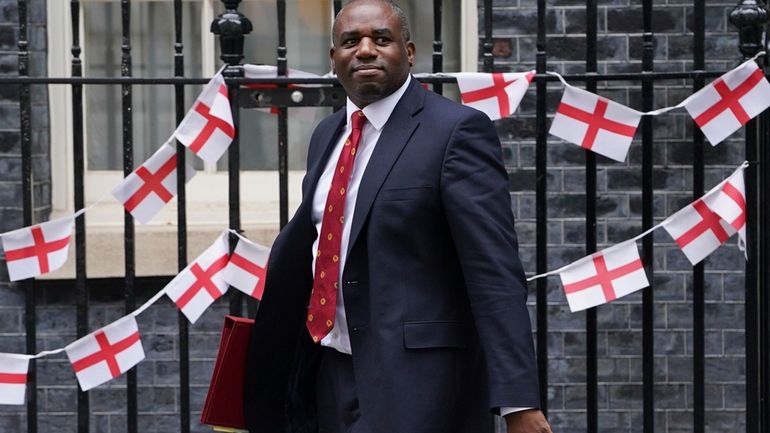 Britain's Foreign Secretary David Lammy leaves Downing Street after a...