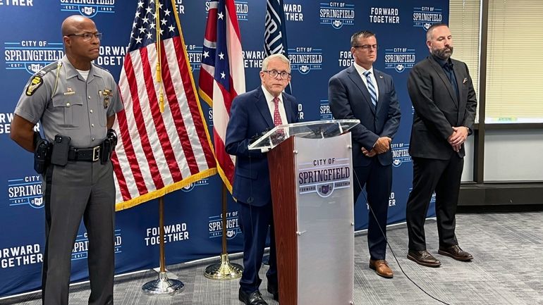 Republican Ohio Gov. Mike DeWine holds a news conference Monday,...