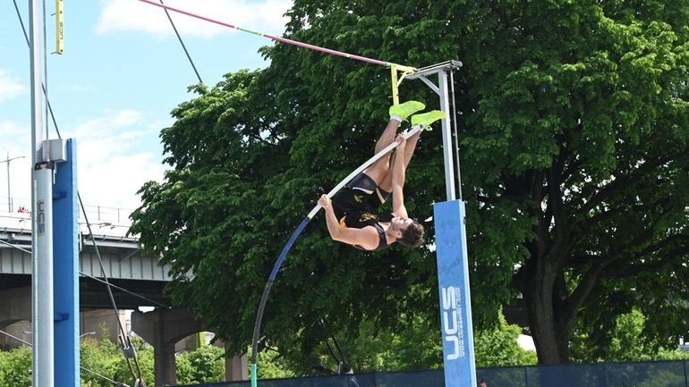 Nicholas Lourenco of St. Anthony pole vaults in the boys...