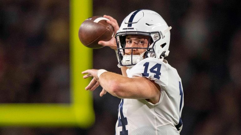 FILE - Penn State quarterback Sean Clifford (14) during an...