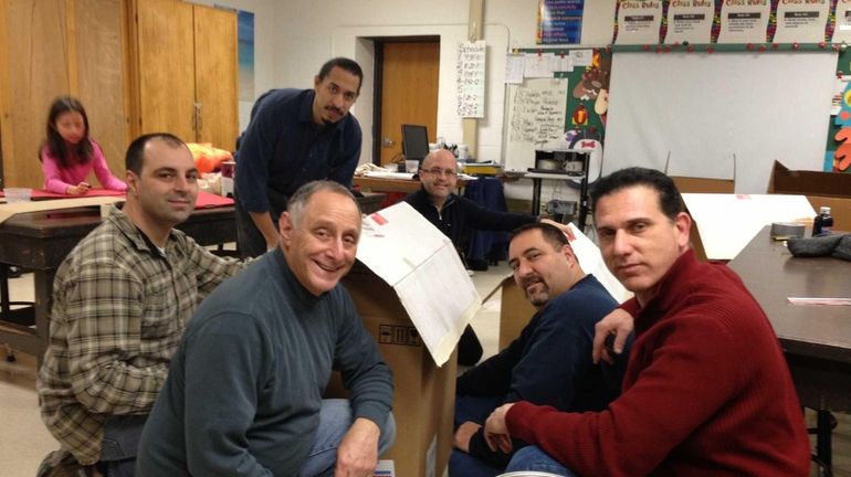 Members of the Smithtown Elementary School Parent Teacher Association's Dads...