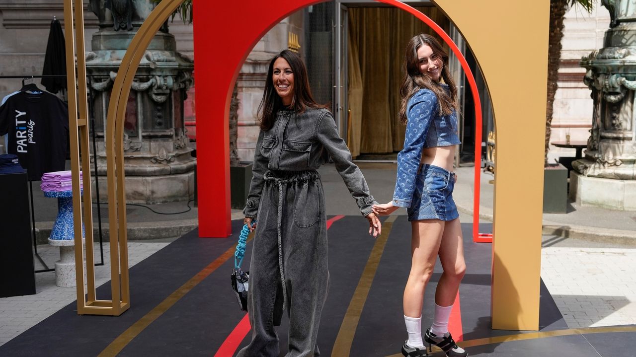 Female Olympians hit the fashion runway in Paris to celebrate hard-won gender parity