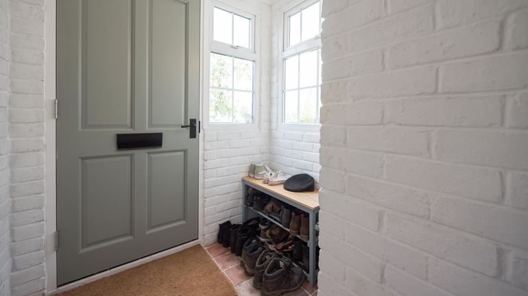 Shoe storage near an entry helps with a tidier home.