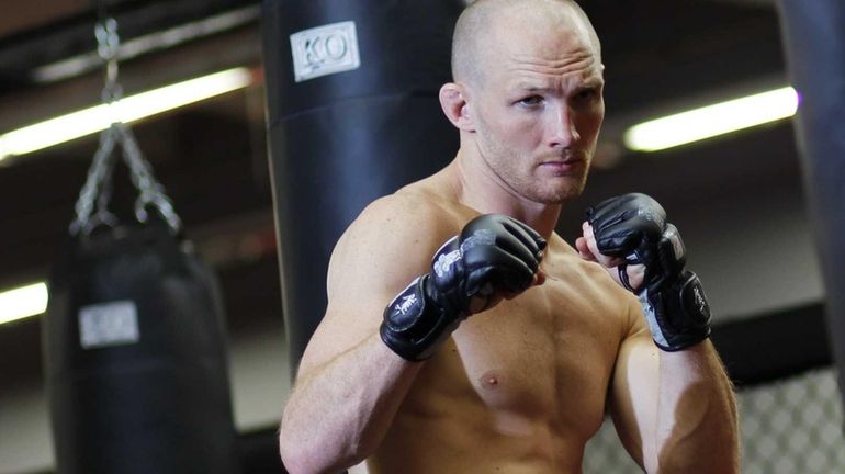 Ryan LaFlare poses for a photo at Long Island MMA...