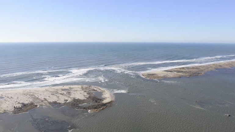 A view of the breach caused by superstorm Sandy on...