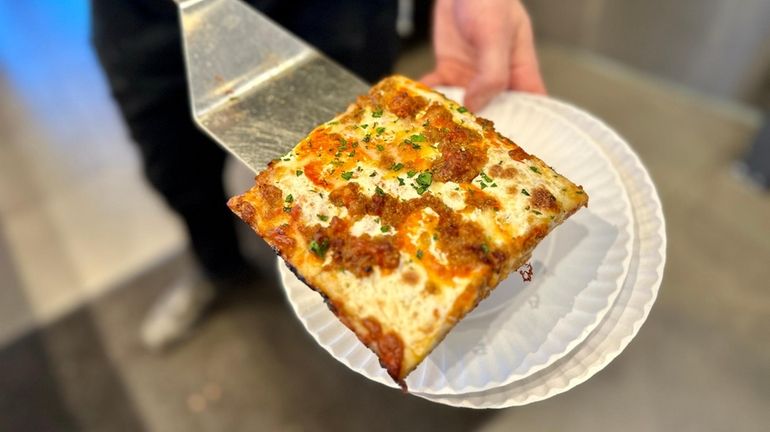 A grandma slice at The Pizzeria in Bay Shore.