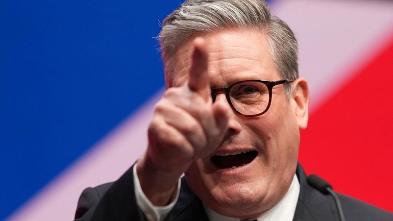 Britain's Prime Minister Keir Starmer addresses members at the Labour...