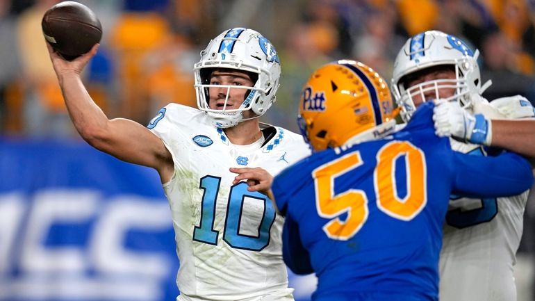 North Carolina quarterback Drake Maye (10) looks to throw a...