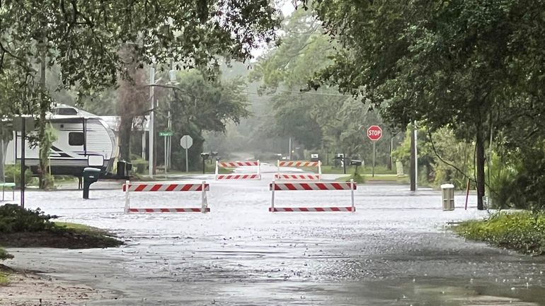 Flooding along Lord Street on Monday, Sept. 16, 2024, in...