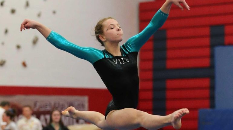 Bethpage gymnast Alyssa Firth performs her floor exercise during the...