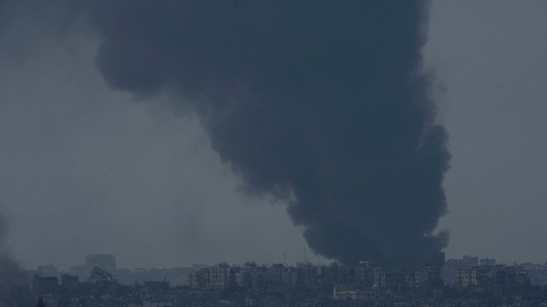 Smoke rises following an Israeli bombardment in the Gaza Strip,...