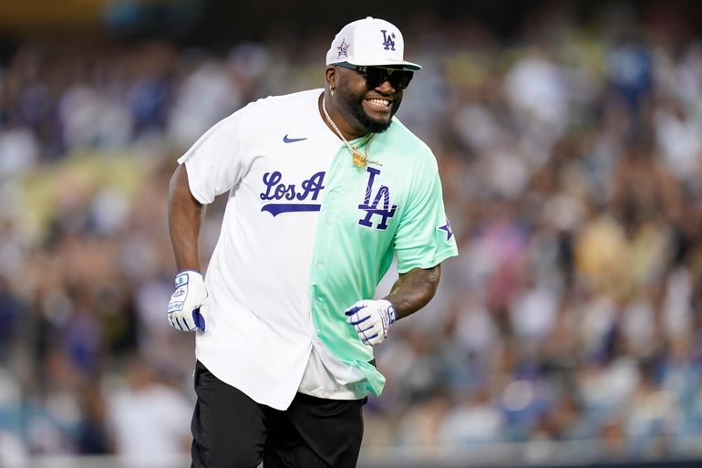 Rapper and singer Bad Bunny runs in the outfield during the MLB All Star  Celebrity Softball game, Saturday, July 16, 2022, in Los Angeles. (AP  Photo/Mark J. Terrill)