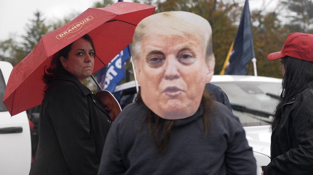 Trump supporters wave the flag in Great Neck Newsday