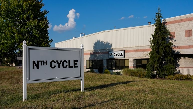 A sign stands outside metal recycler Nth Cycle, Thursday, Sept....