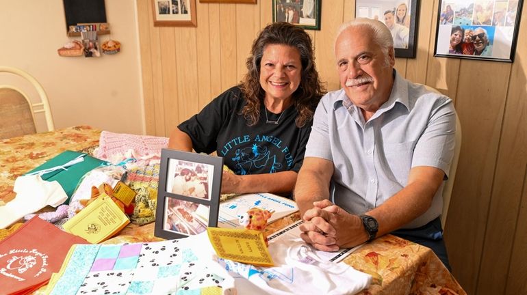 Jenny and Joseph Tranfaglia in their Farmingville home.