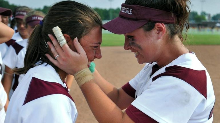 Bay Shore's Amber Fogarty (left) and Kelsey Fischer celebrate following...