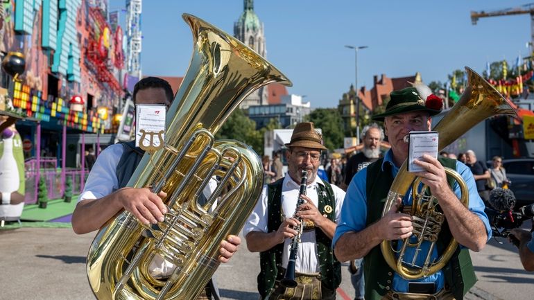 A brass band plays during a press tour at the...