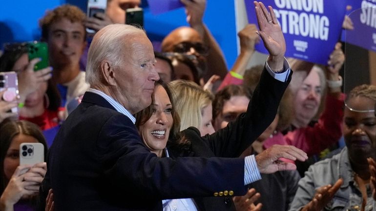 Democratic presidential nominee Vice President Kamala Harris campaigns with President...