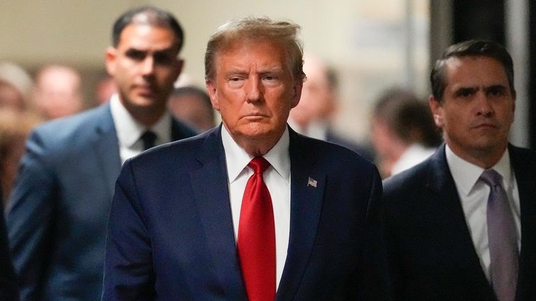 Former President Donald Trump arrives at Manhattan criminal court on...