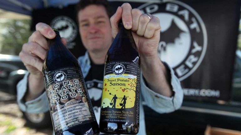 Paul Dlugokencky, owner of the Blind Bat Brewery, with his...