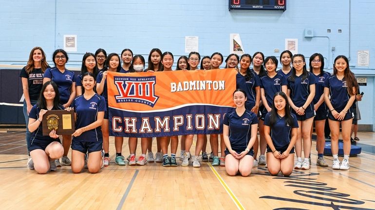 Head coach Allison Romeo Gottfried (back row left) and the...