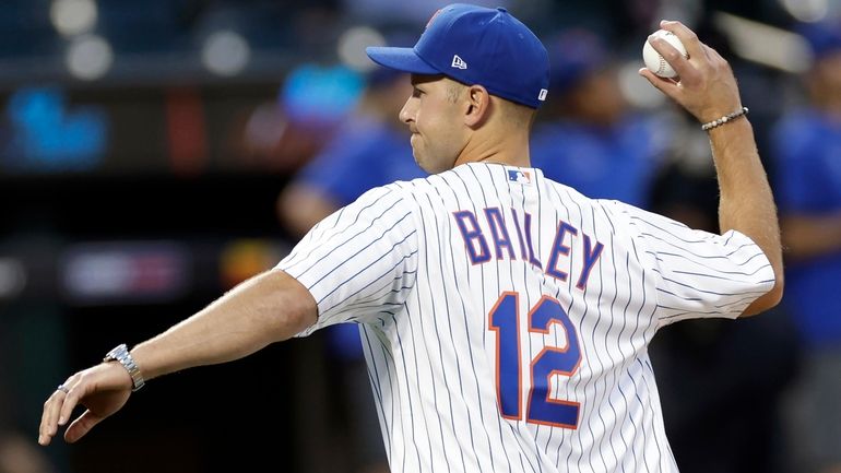 The Islanders' Josh Bailey throws out a ceremonial first pitch...