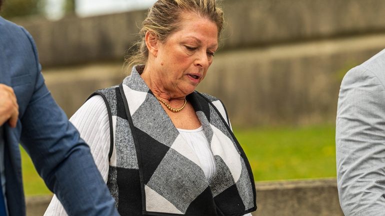 Ann Marie Drago arrives at court early Friday morning as...