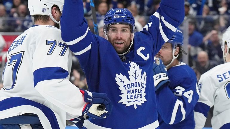 Toronto Maple Leafs center John Tavares (91) celebrates his goal...