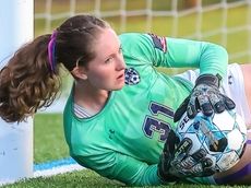 She beat cancer. Now she's backstopping one of Suffolk's top soccer teams